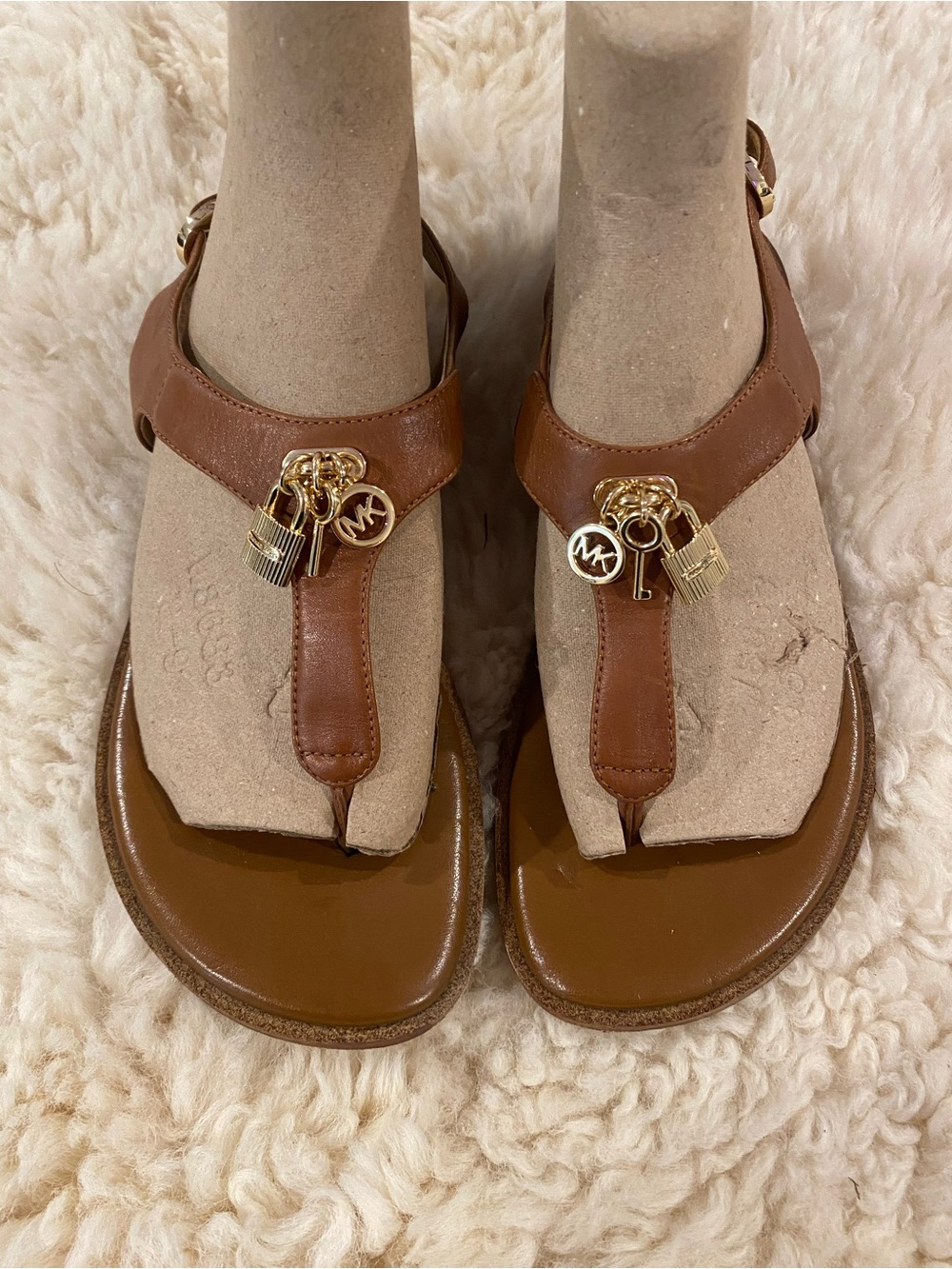 Michael Kors Cognac Leather T-Strap Sandals with Gold MK Charms